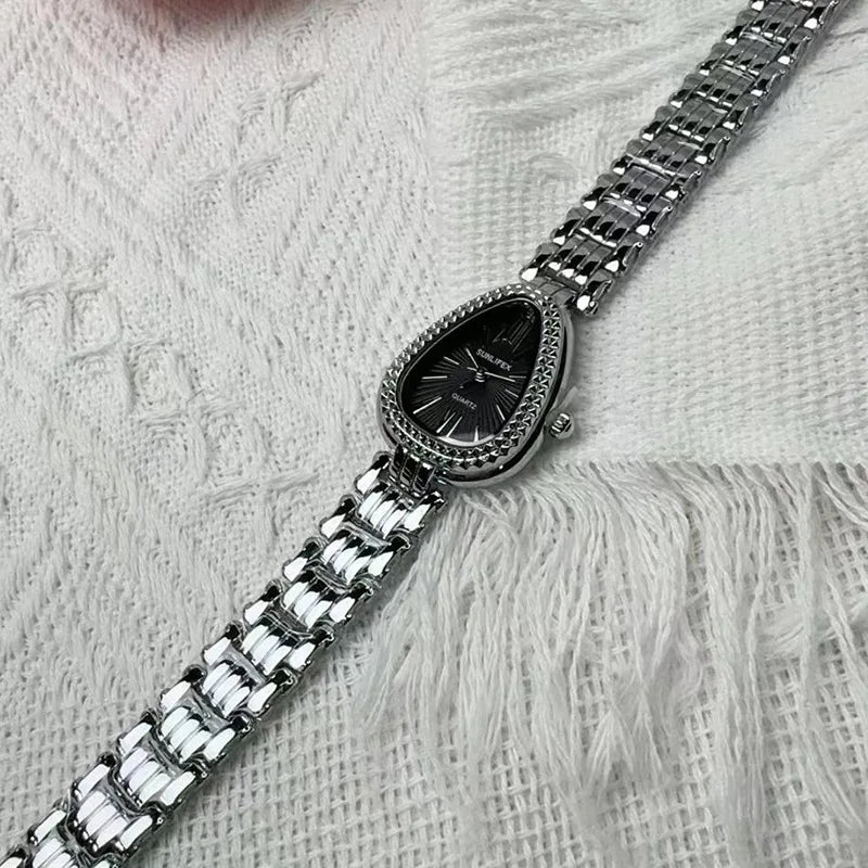 Elegant Snake-Inspired Women’s Quartz Watch – Fashion Silver & Gold Design